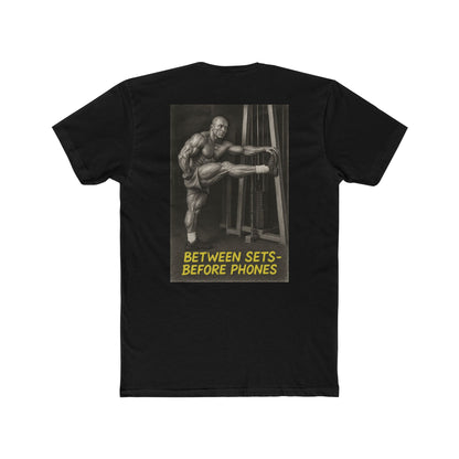 Black t-shirt with graphic of a muscular man and text on a white background