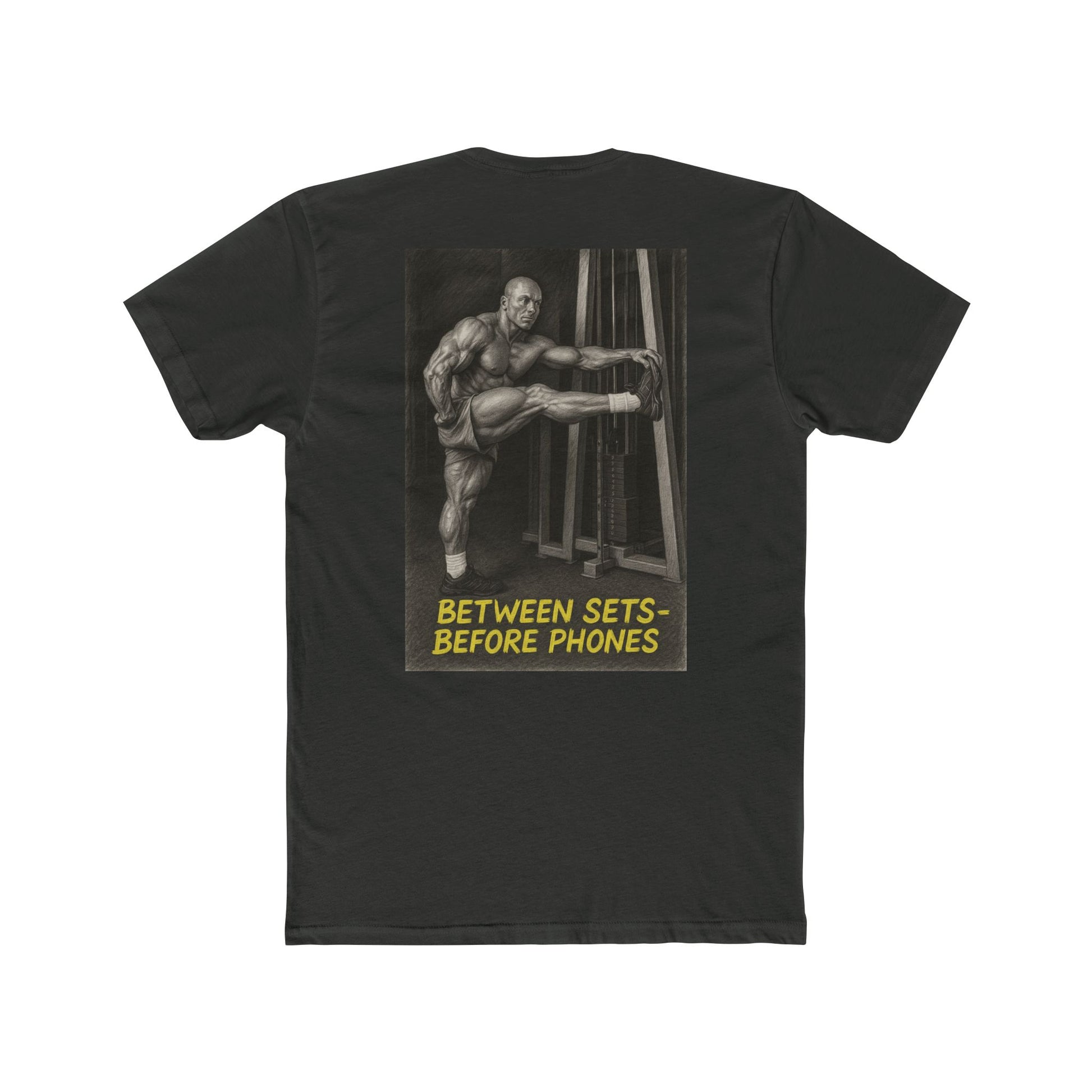 Black t-shirt with graphic of a muscular man and text 'Between Sets Before Phones' on a white background