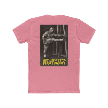 Pink t-shirt with a graphic of a muscular man and text on the back, on a white background